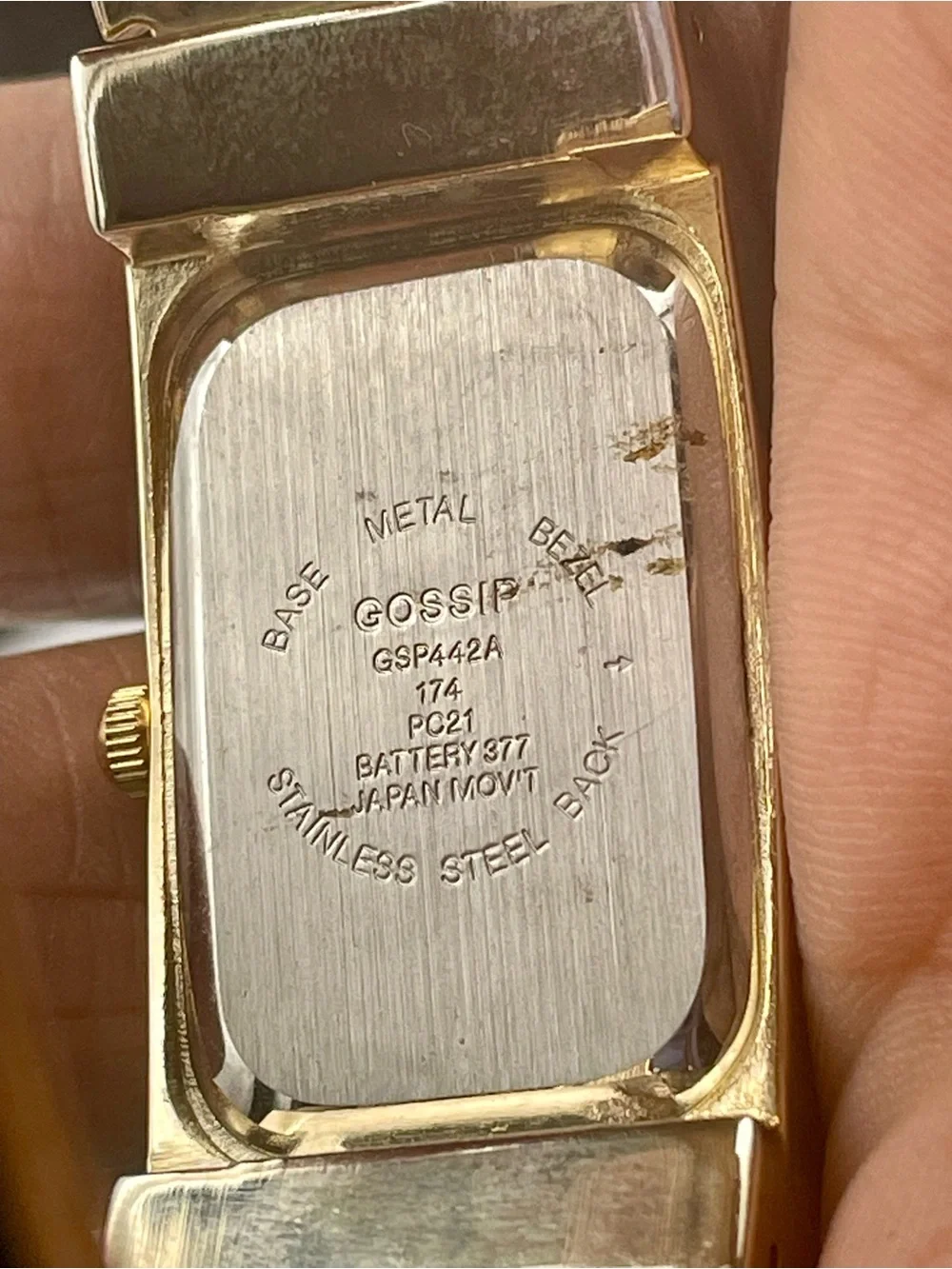 Gossip Gold-Tone Black and Champagne Crystal Bangle Watch. In original box.